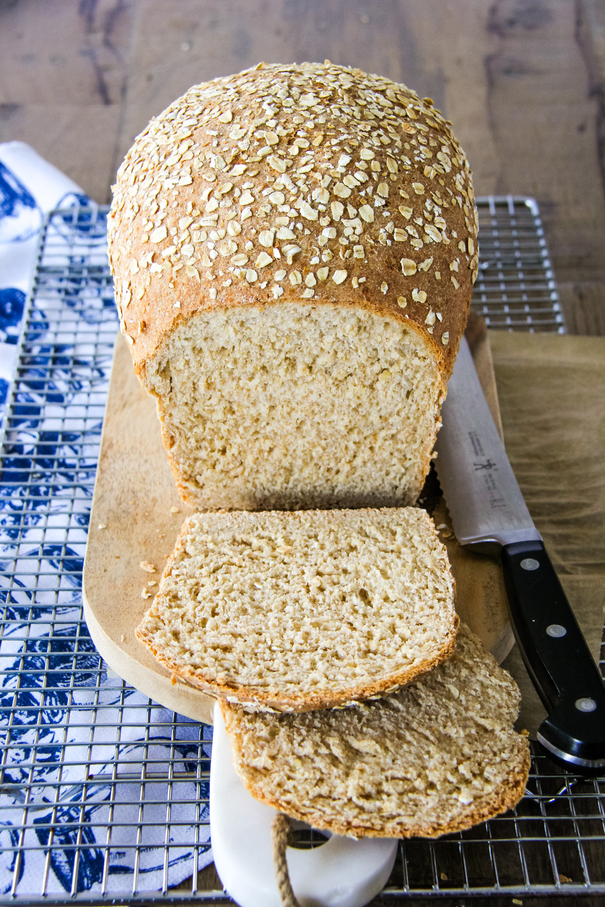 a top view of a loaf of oatmeal bread cut into slices