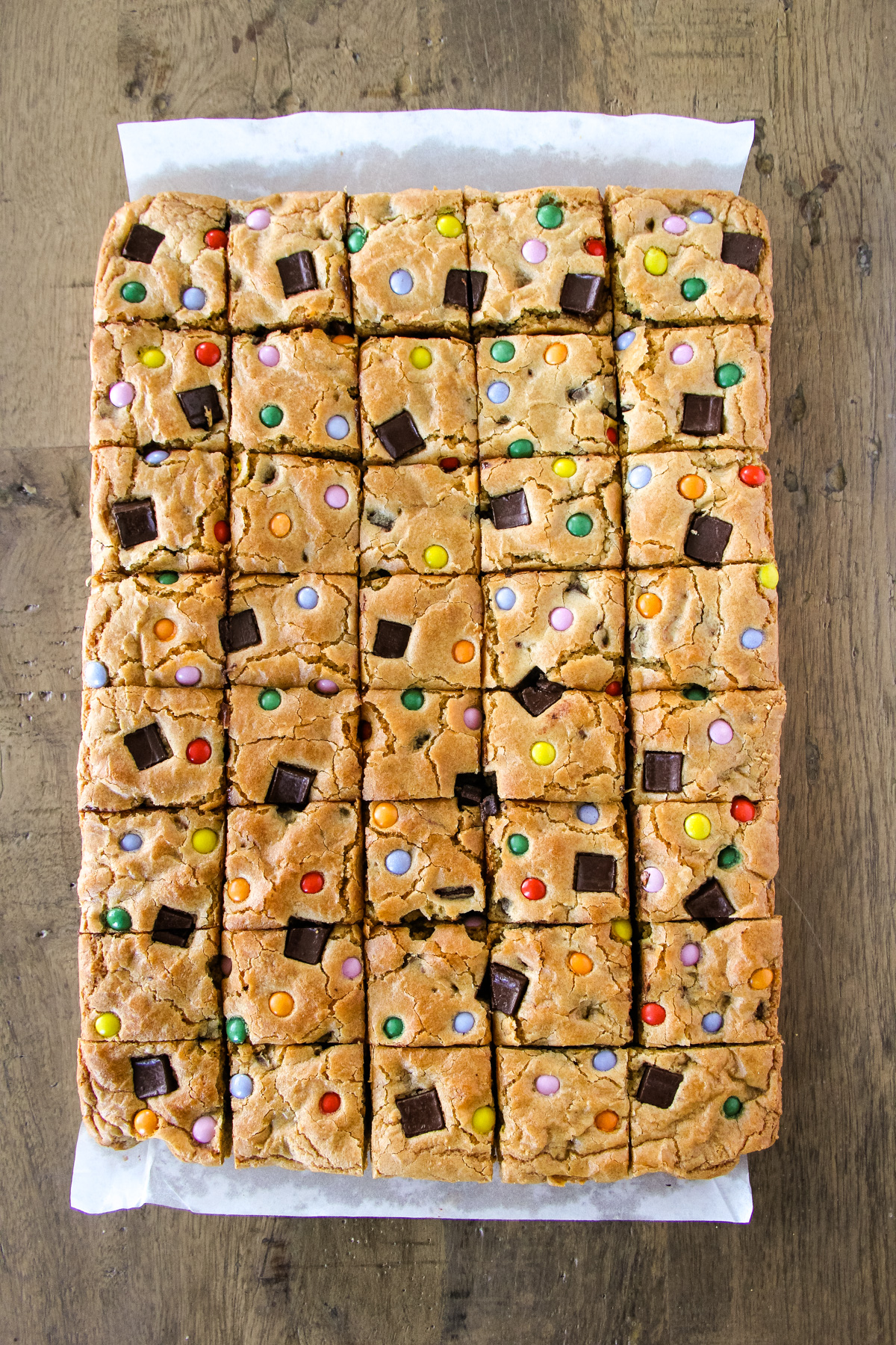 a top down image of chocolate chip cookie bars cut into squares