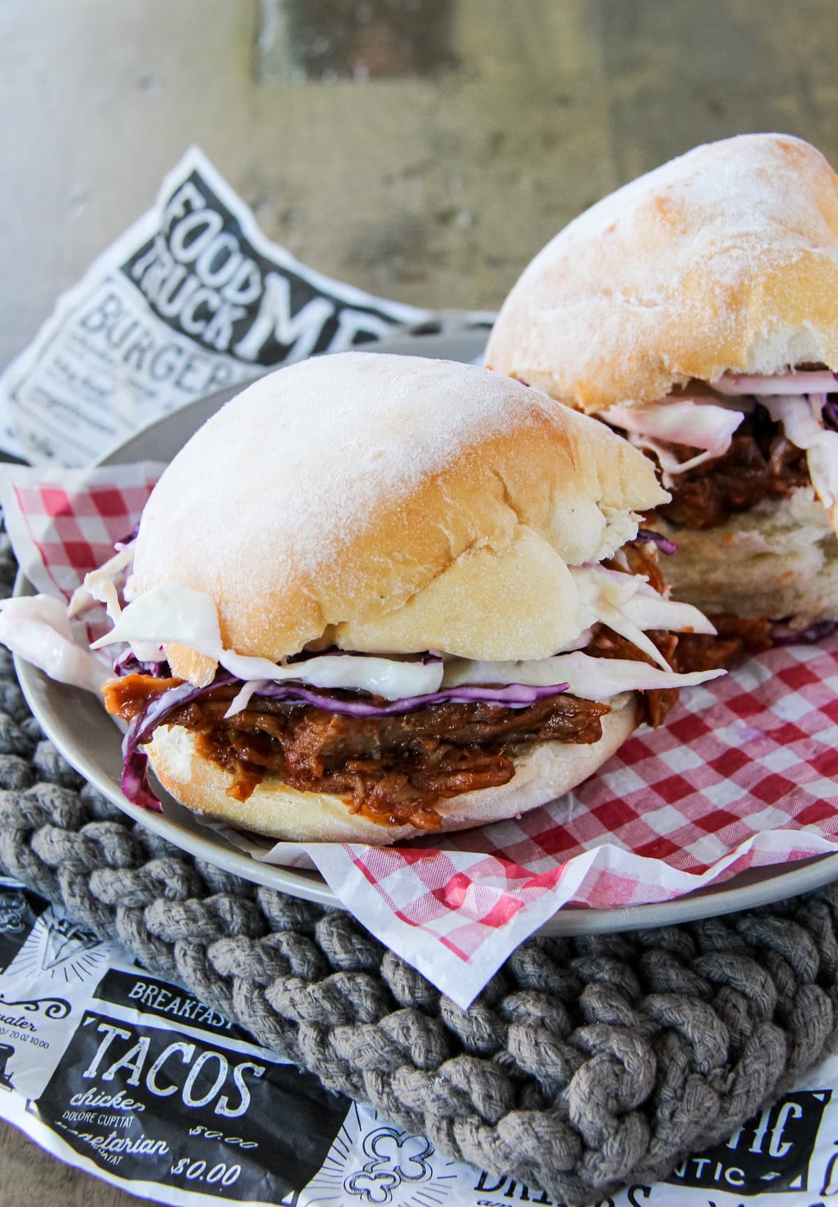 a pulled pork sandwich made from slow roasted pork shoulder