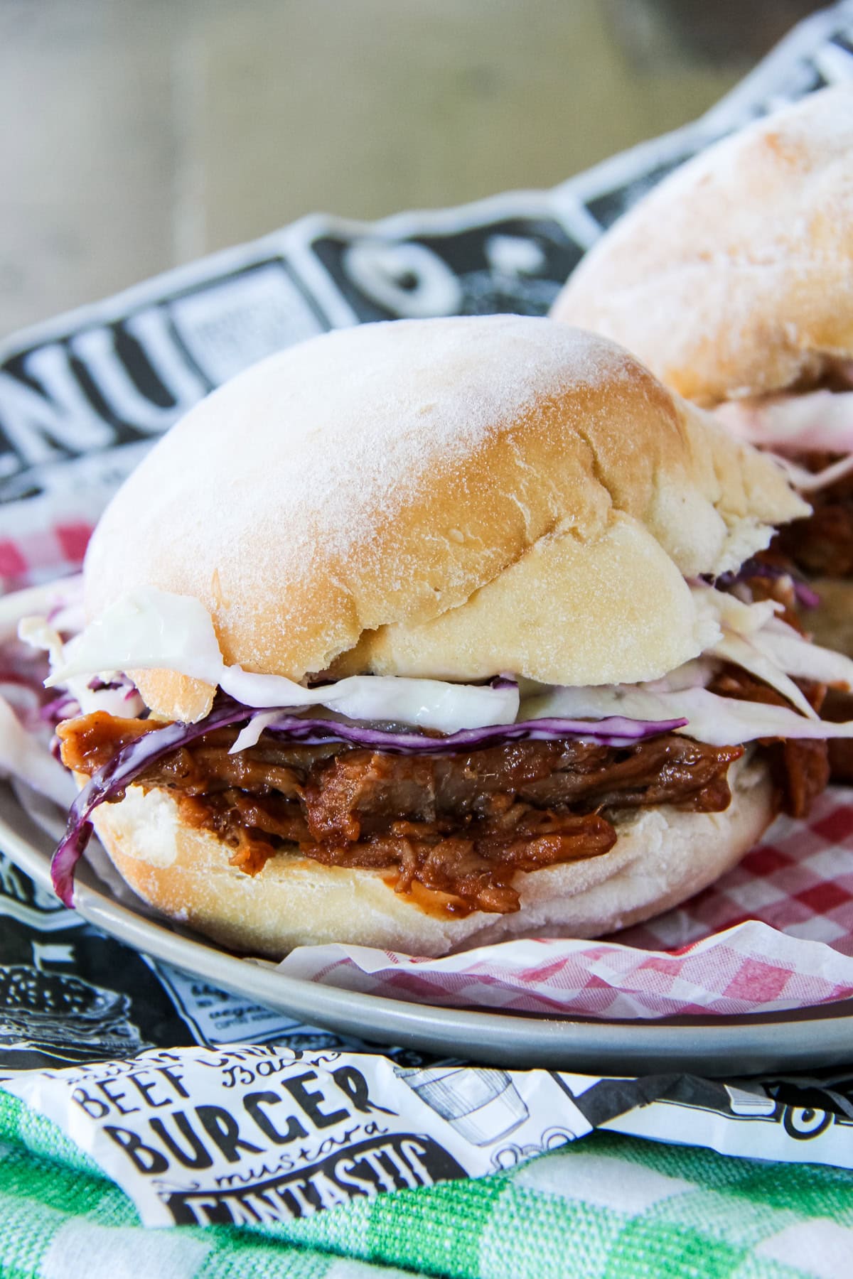 a pulled pork sandwich made from slow roasted pork shoulder