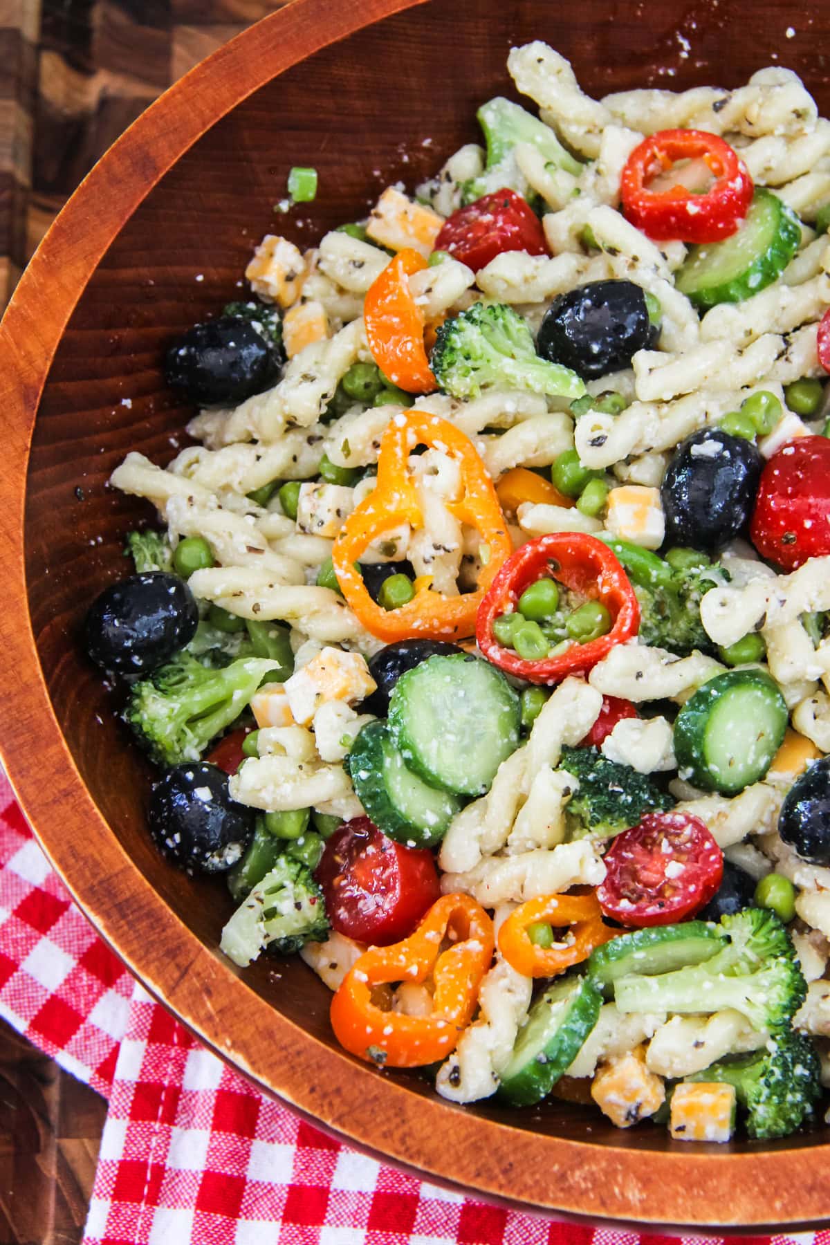 simple pasta salad in a wooden serving bowl
