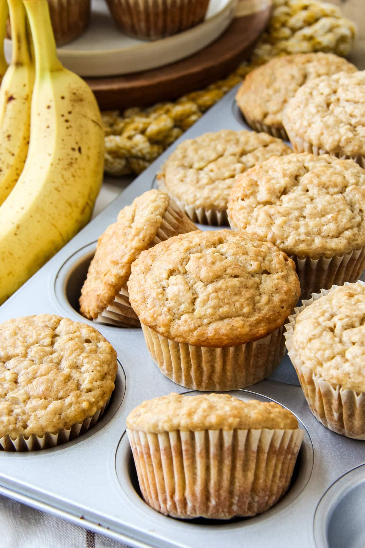 banana oatmeal muffins in a muffin tray